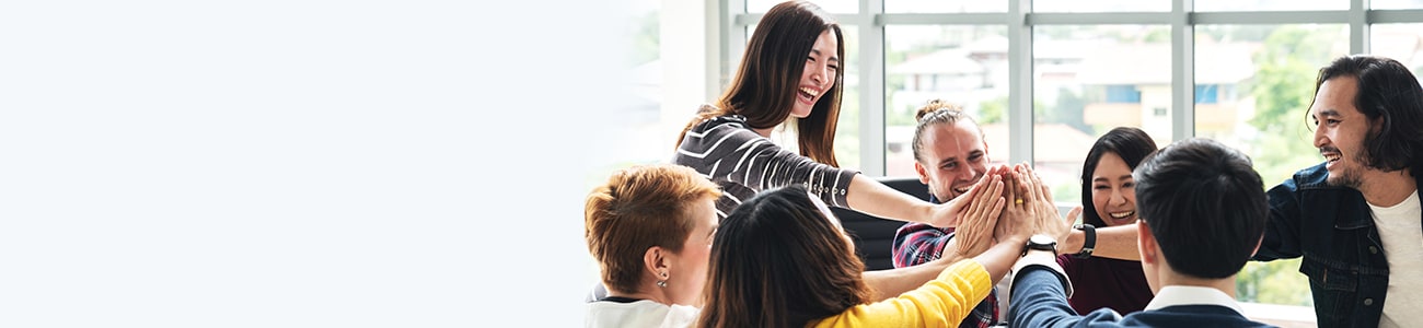 Group of people laughing and smiling